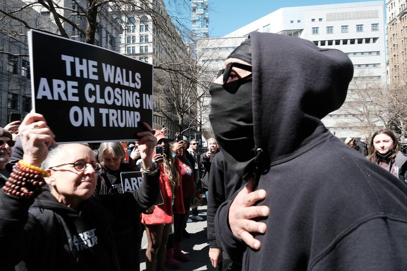 Supporters and critics of Donald Trump gather outside a Manhattan courthouse on Tuesday ahead of his anticipated indictment over an alleged 'hush money' payment to porn star Stormy Daniels. Photograph: Spencer Platt/Getty Images
