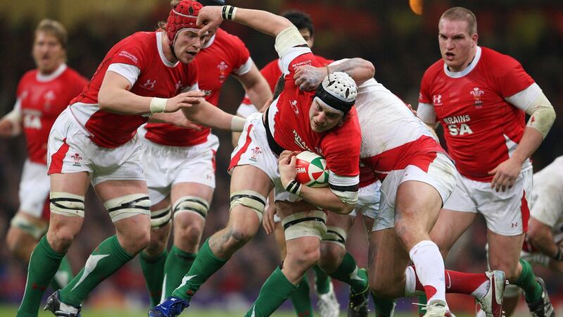 Ryan Jones carries for Wales during their 23-15 win over England in 2009. Photograph: Billy Stickland/Inpho