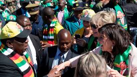 Zimbabwe’s Zanu-PF courts white farmers for general election