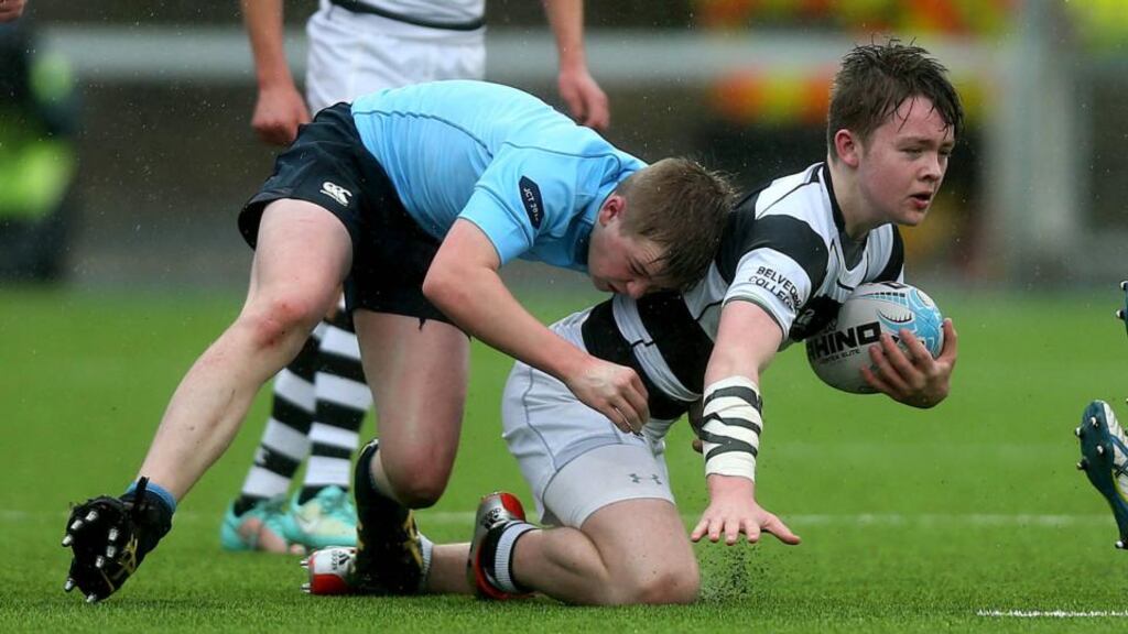 Ruadhan Byron of Belvedere is tackled by Conor Treacy of St Michael’s at Donnybrook. Photograph: Donall Farmer/Inpho