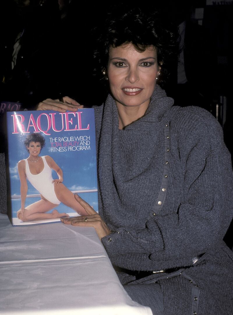 Actress Raquel Welch autographs copies of Raquel: The Raquel Welch Total Beauty and Fitness Program. Photograph: Ron Galella, Ltd./Ron Galella Collection via Getty Images