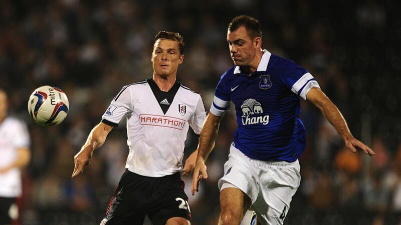 Everton’s Darron Gibson battles for possession with Fulham’s Scott Parker (left) at Craven Cottage. Photograph: Adam Davy/PA Wire