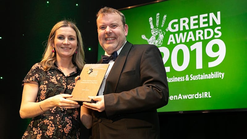 Geoff Codd, Head of Marketing & Retail Development, Energia presents the Green Medium Sized Organisation of the Year award to Áine Martin, Hotel Doolin.