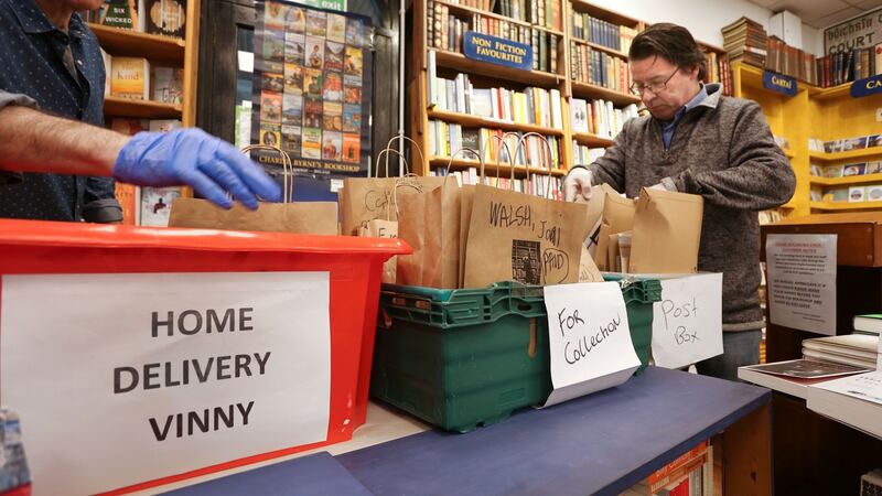 Charlie Byrne's Bookshop manager Vinny Byrne packing books for delivery at the shop in The Cornstore, Middle Street, Galway city. Photograph: Joe O'Shaughnessy
