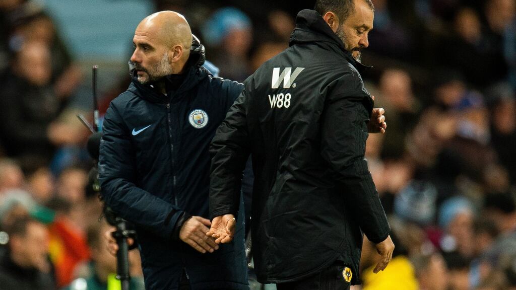 Manchester City manager Pep Guardiola and Wolverhampton Wanderers manager Nuno Espirito Santo at the Etihad Stadium. Photograph: EPA