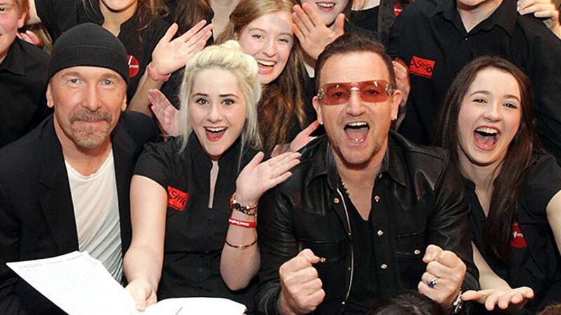 Edge and Bono with students who have benefited from Music Generation tutelage: “What we want to do is really simple, we just want to make sure that everyone, whatever their background, gets access to music tuition”