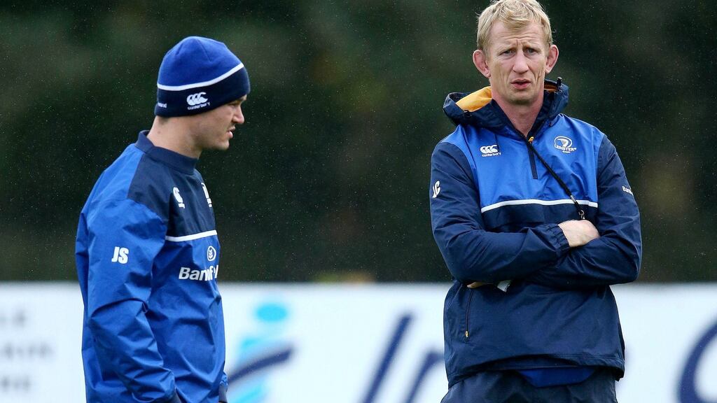 Jonathan Sexton with Leinster head coach Leo Cullen at squad training. Photograph: Cathal Noonan/Inpho