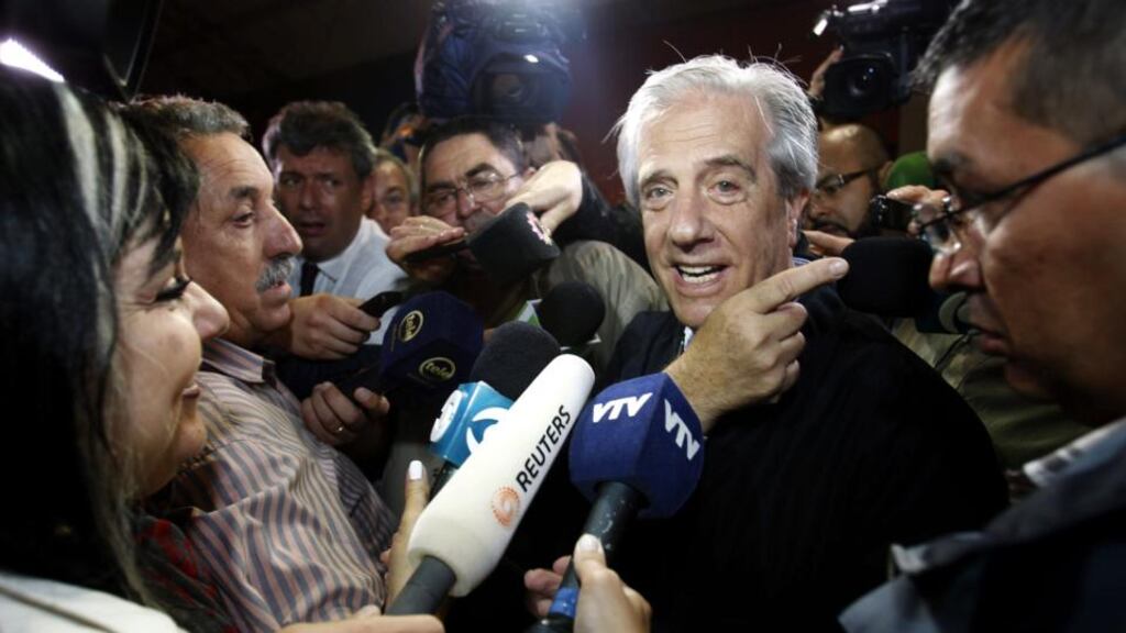 Candidate and former president, Tabare Vazquez, talks to media after voting for the run-off elections  in Montevideo, Uruguay yesterday. EPA/Ivan Franco