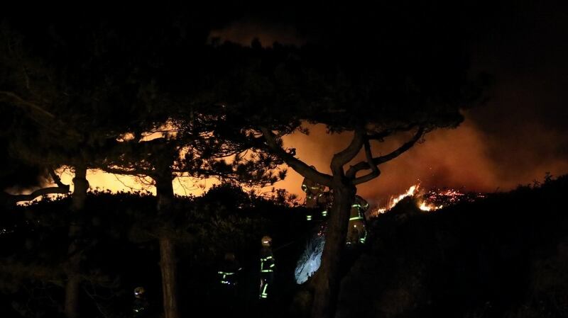 Firefighters tackle a gorse wildfire in Howth on Wednesday night. Photograph: Dublin Fire Brigade/Twitter