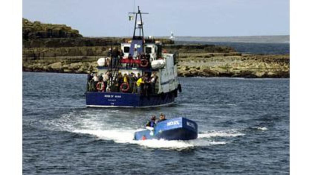 Passengers are transported from a ferry in Doolin Harbour, Co Clare. Photograph: Frank Miller/The Irish Times