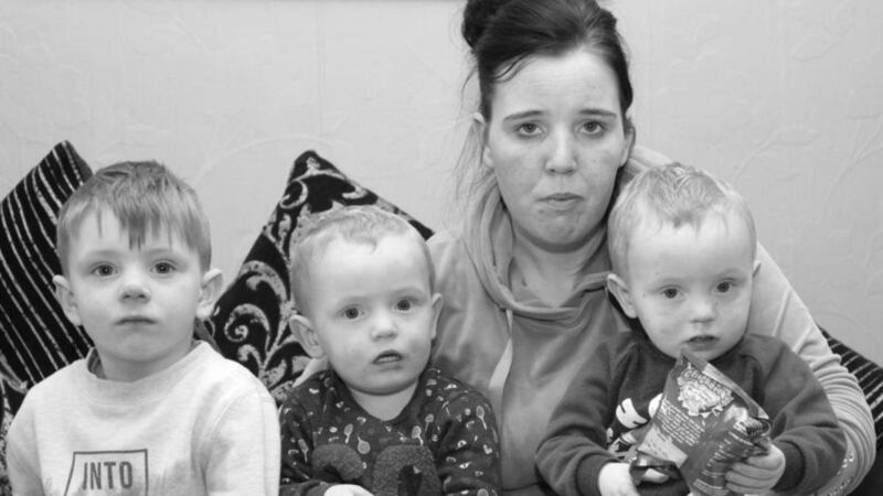 Child poverty in Limerick: Joanne Ryan with her children Tyler and twins DJ and Troy. Photograph: Liam Burke/Press 22
