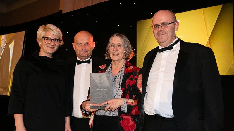 Dr Shelagh Waddington, Emeritus Lecturer, Geography Department, Maynooth University presents the Best Library Team award to Monika Bukowska, Jerald Cavanagh and Padraig Kirby, Limerick Institute of Technology.