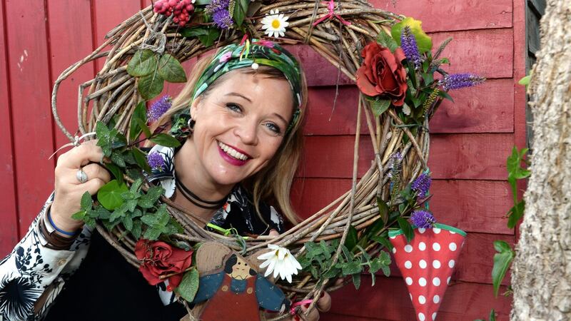 Deborah Donnelly with the Christmas wreath she made. Photograph: Cyril Byrne