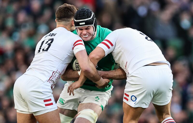 Ireland’s James Ryan is tackled by Henry Slade and Jamie George. Photograph: Billy Stickland/Inpho