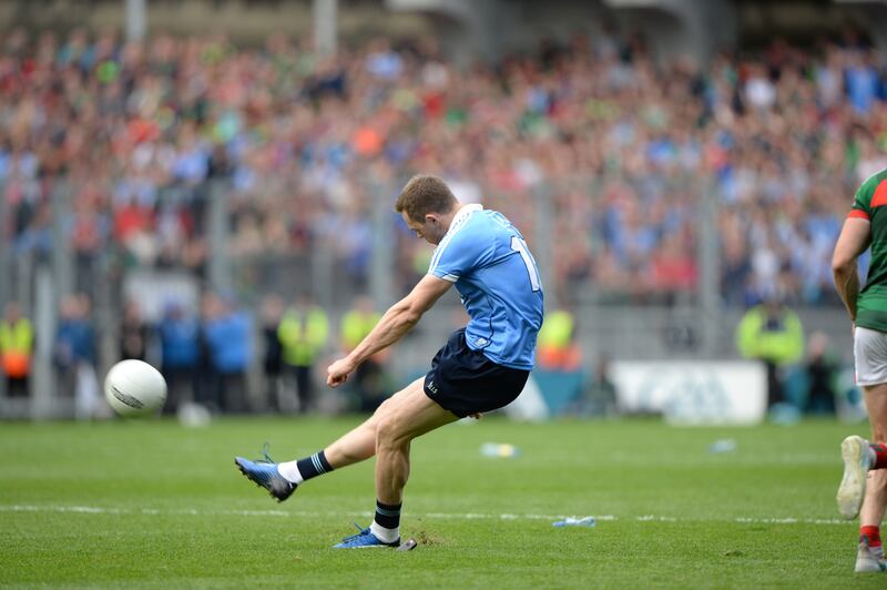 Dean Rock kicks the winning point against Mayo in the 2017 All-Ireland Final at Croke Park. Photograph: Dara Mac Dónaill
