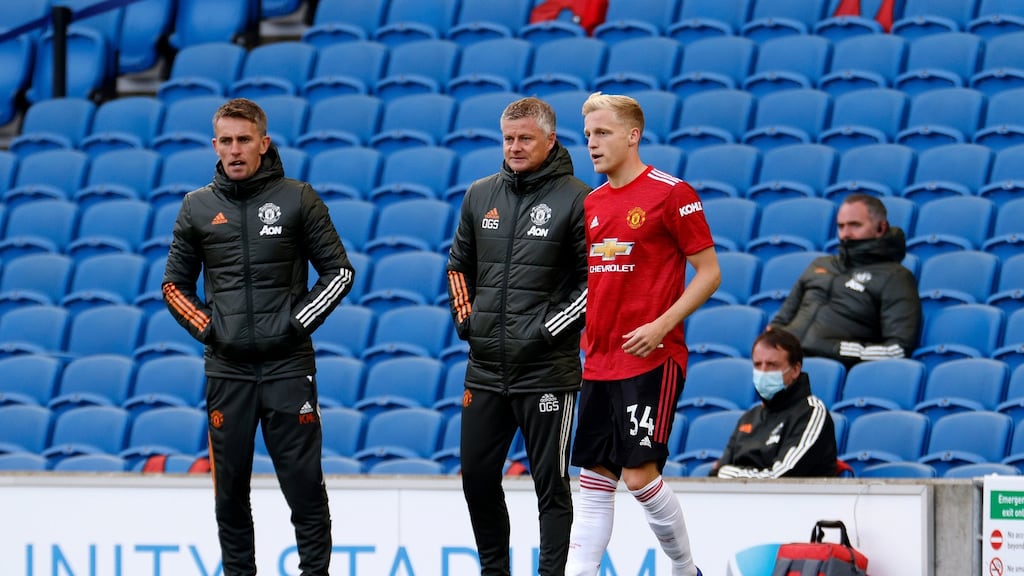 Ole Gunnar Solskjaer speaks with Donny Van De Beek during the Premier League win over Brighton. Photo: John Sibley - Pool/Getty Images