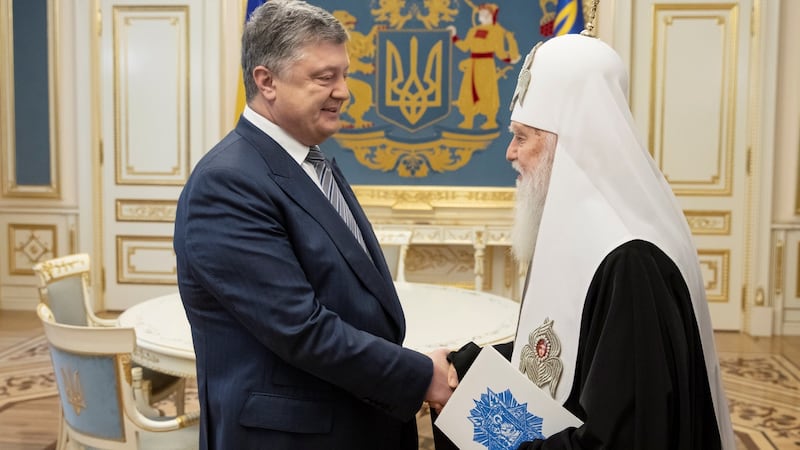 Ukrainian president Petro Poroshenko with Patriarch Filaret, head of Ukraine’s Orthodox Church in Kiev: The bid to secure independence “will cause a huge upsurge in the national spirit”. Photograph: Mikhail Palinchak/Ukrainian Presidential Press Service