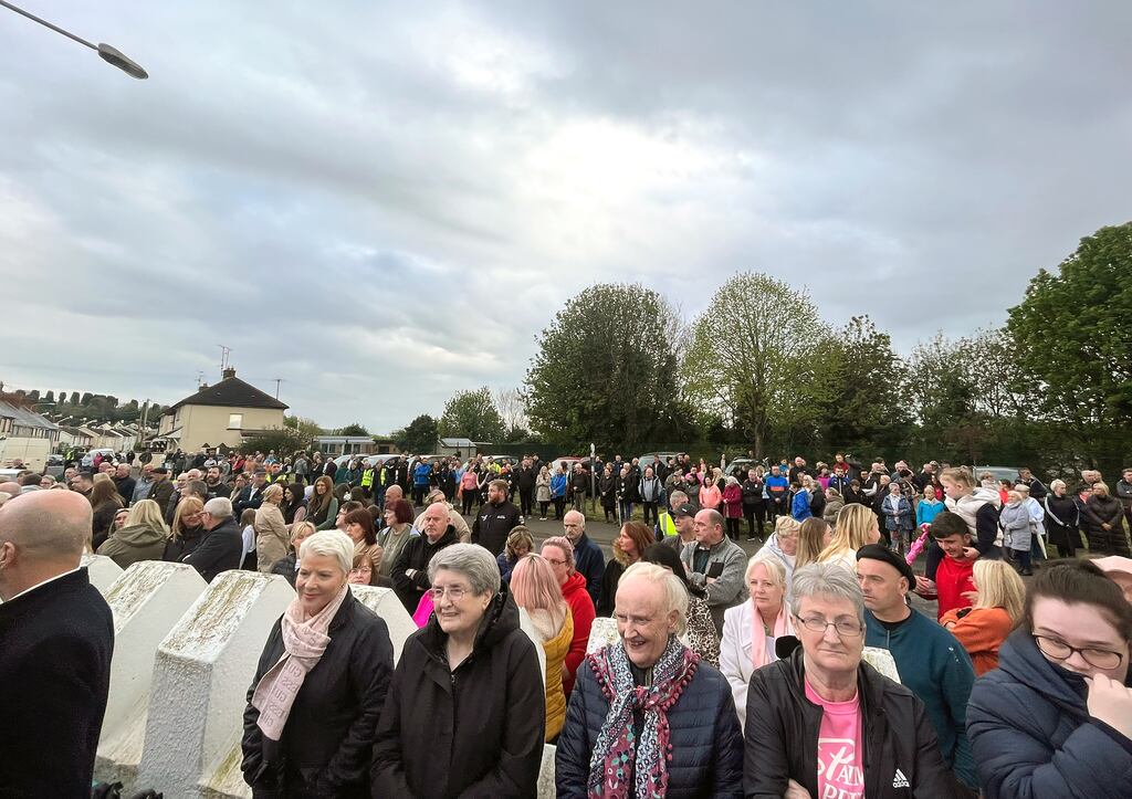 People attend a vigil at a grotto in Strabane for the victims of Thursday's road collision in Co Tyrone on Friday. Photograph: Claudia Savage /PA Wire