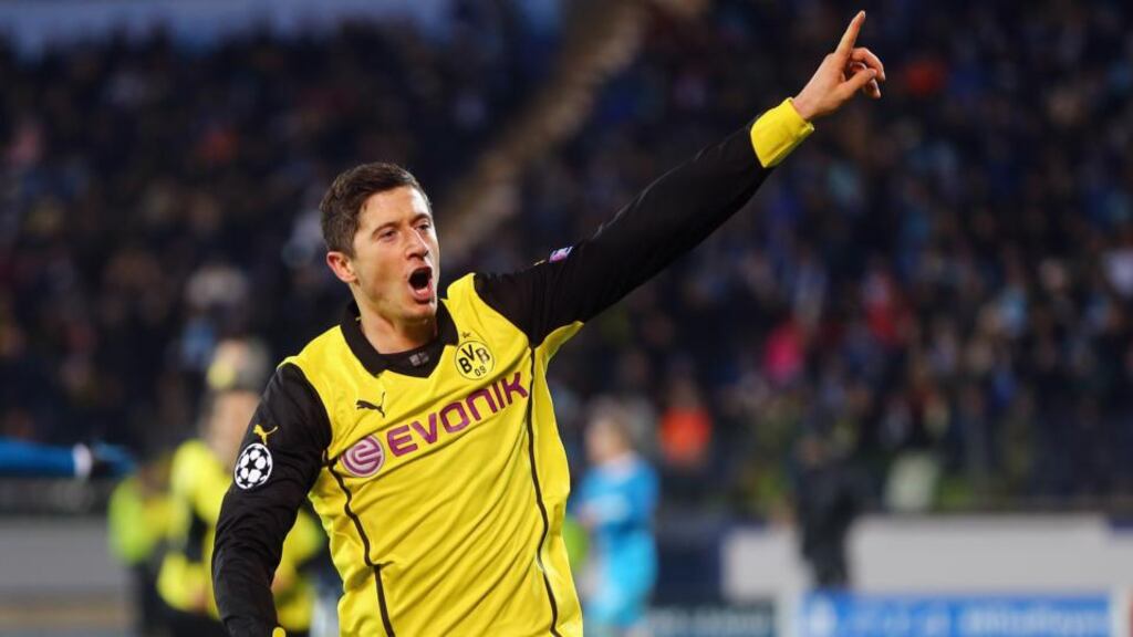 Robert Lewandowski celebrates Dortmund’s fourth goal against Zenit. Photograph: Alex Grimm/Bongarts/Getty Images