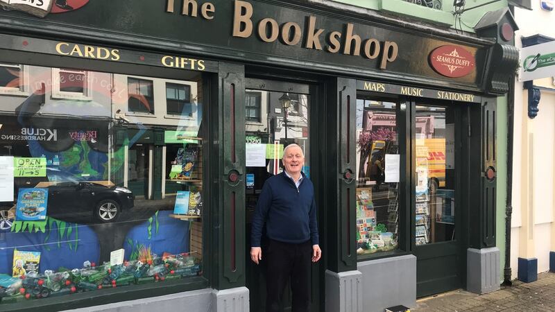 Seamus Duffy outside the bookshop on Westport’s Bridge Street
