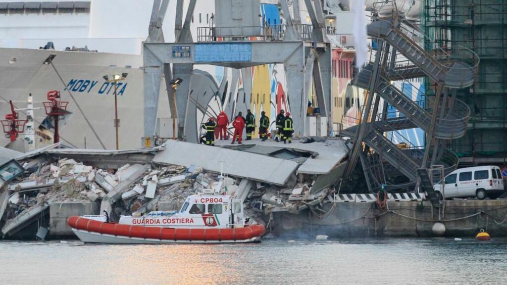 Rescuers continued their search through the debris this morning for seven missing people. At least three people were killed and six injured when a container ship rammed a control tower in the northern Italian port city of Genoa. The huge control tower, which reports said was more than 50 metres (160 feet) high, was destroyed by the impact. Photograph: Alessandro Garofalo/Reuters