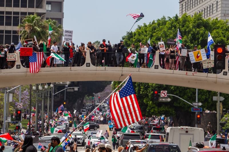 Demonstrators march against Donald Trump in Los Angeles, California. Photograph: Apu Gomes/Getty Images
