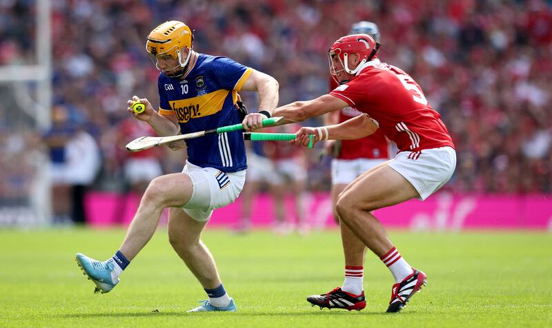 Cork’s Ciaran Joyce and Jake Morris of Tipperary. Photograph: Ryan Byrne/Inpho