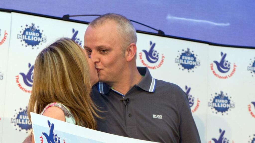 Car mechanic and racing driver Neil Trotter, with partner Nicky Ottaway, during a press conference in Dorking, Surrey where he was revealed as the man who scooped the latest Euromillions jackpot. Photograph: Steve Parsons/PA