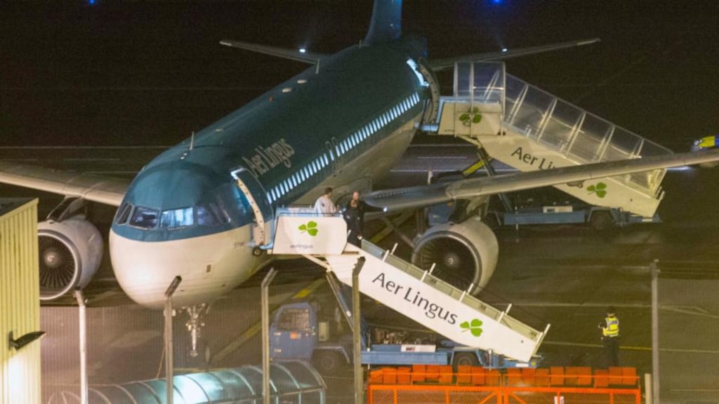 Garda technical team pictured during the examination of an Aer Lingus at Cork Airport on which the 24-year old man died. Photograph: Daragh McSweeney/Provision