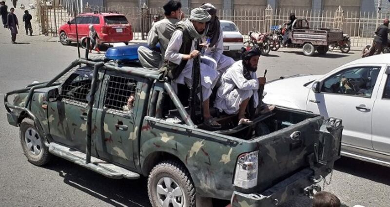 Taliban fighters in a vehicle of the Afghan National Directorate of Security in Kandahar. Photograph: AFP/Getty Images