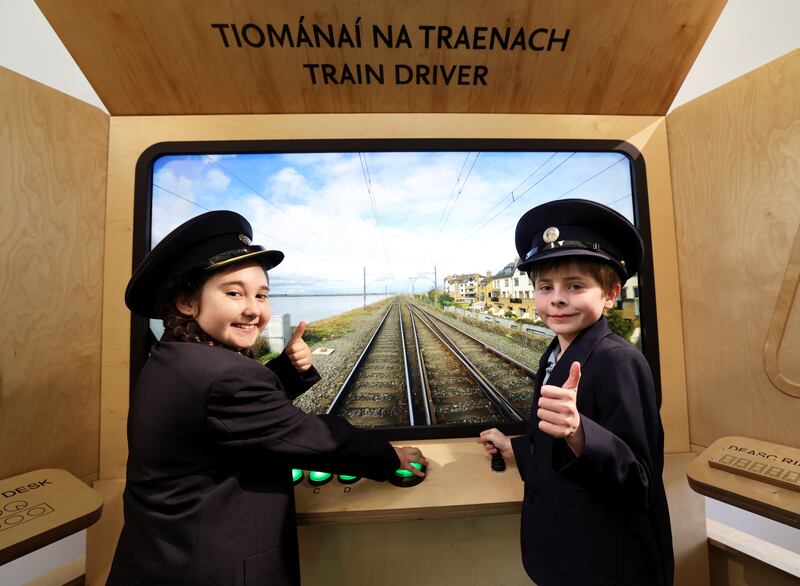 Maisie Bell (9) and Mossie Coyle (8) enjoy the interactive children's railway exhibit at the Casino Model Railway Museum in Malahide. Photograph: Jason Clarke