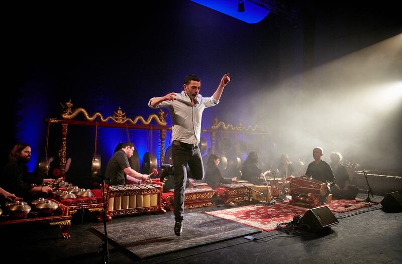 Colin Dunne (dancing) and Mel Mercier performing with the Irish Gamelan Orchestra. Photograph: Maurice Gunning