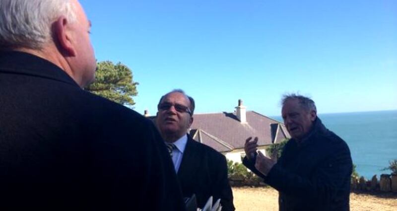Broadcaster Vincent Browne in discussion with members of the New Land League in the grounds of Gorse Hill. Photograph: Tim O’Brien