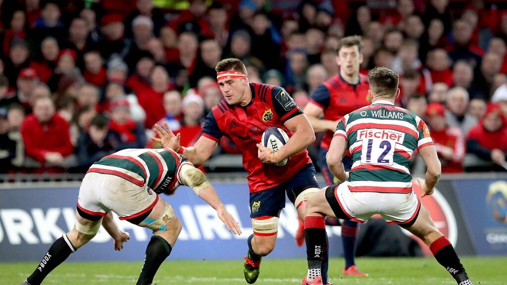 Munster’s CJ Stander prepares to evade the tackle of Leicester’s Brendon O’Connor at Thomond Park. Photograph: Ryan Byrne/Inpho