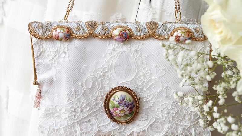 A wedding bag made by Cathy White from vintage fabrics and frames.