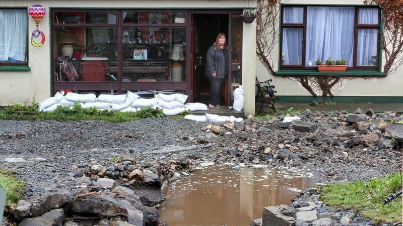 Fiona Shanahan looks out from her house which was flooded in Clifden. Photograph: Joe O’Shaughnessy