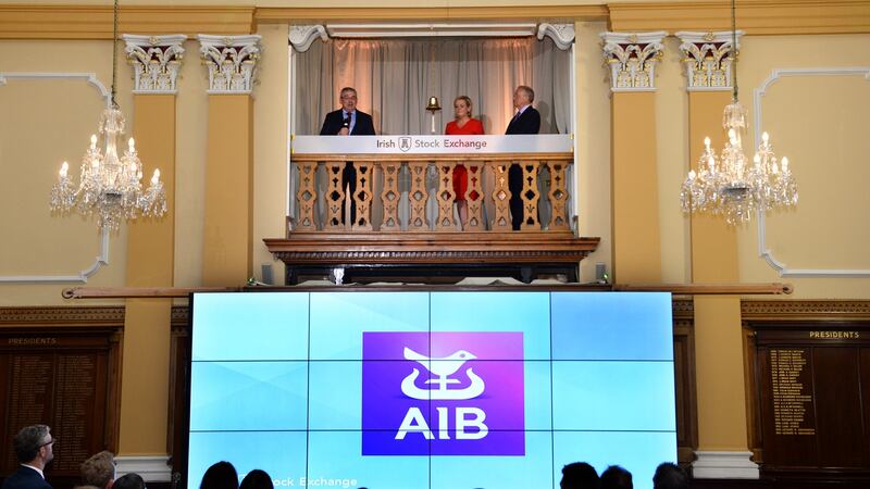 AIB CEO Bernard Byrne rings the bell at the Irish Stock Exchange with Irish Stock Exchange CEO Deirdre Somers, and AIB chairman Richard Pym to mark the bank’s IPO. Photograph: Dara Mac Dónaill