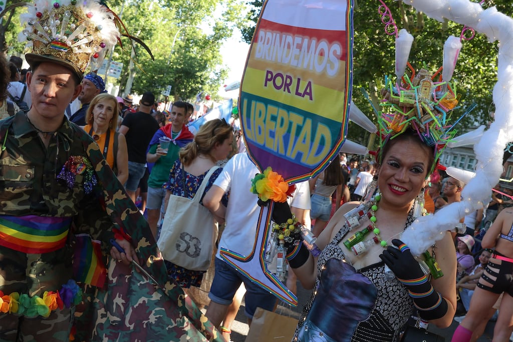 A participant holds a sign reading 'Cheer for freedom' before taking part in the LGBTIQ Pride parade in Madrid on July 1st, 2023. Photograph: Pierre-Philippe Marcou/AFP via Getty Images
