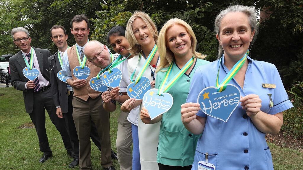 Consultant nephrologist Dr Colm Magee (far left) with consultants in infectious diseases Sam McConkey, consultant in infectious diseases Eoghan de Barra, consultant neurosurgeon John Caird, senior staff nurse Kavitha Tauro, consultant physician Cora McNally, healthcare assistant Bríd Sweeney and breast care nurse Louise Costigan, who were all honoured. Photograph: Robbie Reynolds