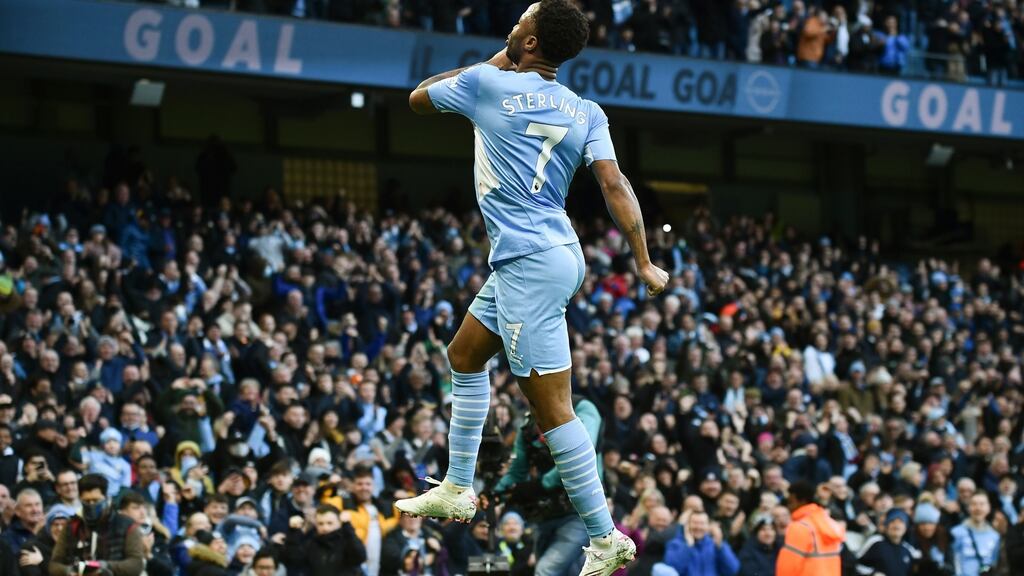 Raheem Sterling of Manchester City celebrates after scoring the opener in their Premier League win over Everton. Photo: Peter Powell/Getty Images