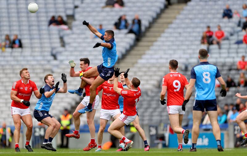 Dublin’s James McCarthy punches a kick-out during the Leinster SFC Final against Louth at Croke Park. Photograph: James Crombie/Inpho