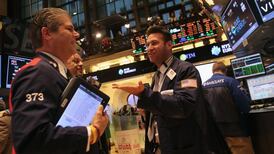 Shares climb on Fed commitment