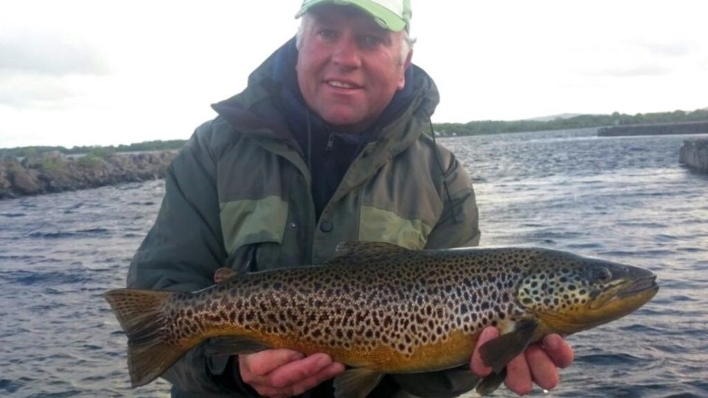 Angling guide Larry McCarthy with yet another fine Corrib trout taken during the mayfly