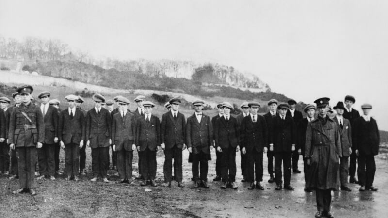 Ireland after the Famine: Irish Republican Army volunteers parade at Moville, in Co Donegal. Photograph: Hulton-Deutsch/Corbis/Getty