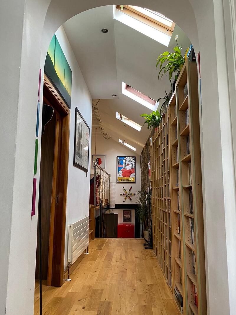 The library shelves on the landing
