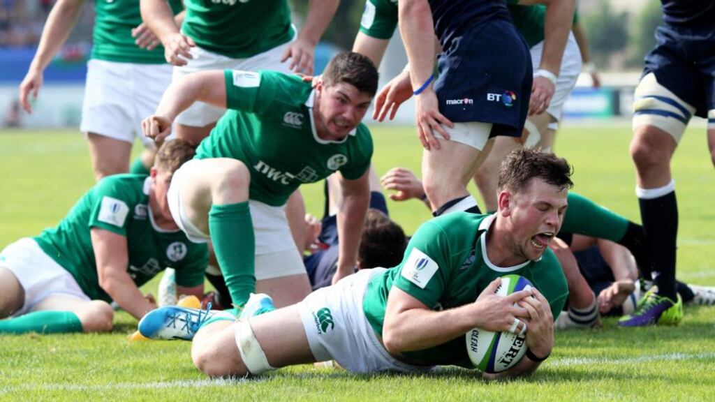 Ireland’s Conor Oliver scores their second try against Scotland. Photograph: Matteo Ciambelli/Inpho