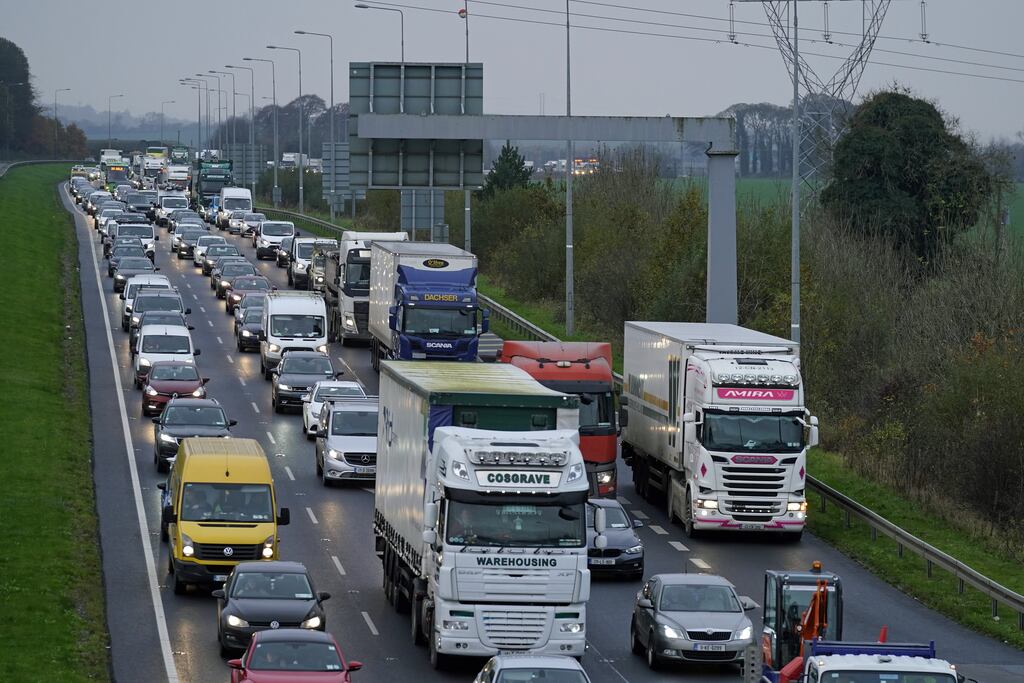 Congestion on the M7 near Naas, in Co Kildare - the Government is to consider plans to cut car journeys as part of its climate strategy (Photo:PA)