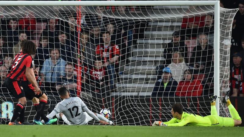 Chris Smalling scores Manchester united’s opener against Bournemouth. Photograph: Glyn Kirk/AFP