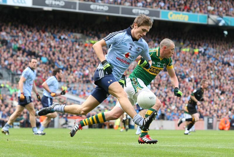 Michael Fitzsimons charges past Kerry's Kieran Donaghy in the 2011 All-Ireland final. Photograph: Cathal Noonan/Inpho
