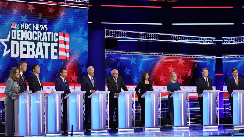 Democratic presidential candidates (L-R) Marianne Williamson, former Colorado governor John Hickenlooper, former tech executive Andrew Yang, South Bend, Indiana Mayor Pete Buttigieg, former Vice President Joe Biden, Sen. Bernie Sanders (I-VT), Sen. Kamala Harris (D-CA), Sen. Kirsten Gillibrand (D-NY), Sen. Michael Bennet (D-CO) and Rep. Eric Swalwell (D-CA) take part in the second night of the first Democratic presidential debate on June 27thin Miami, Florida. Photograph: Drew Angerer/Getty Images
